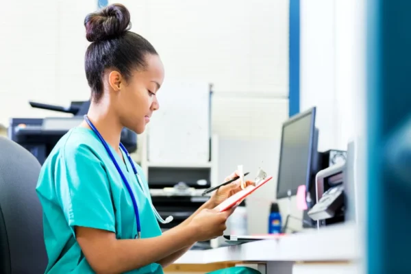 Medical-Biller-cute-african-american-girl-behind-desk-working-and-wearing-scrubs-1024x683-1